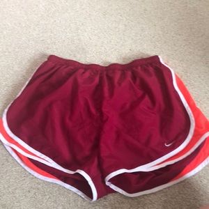maroon white and orange nike dri tempo shorts